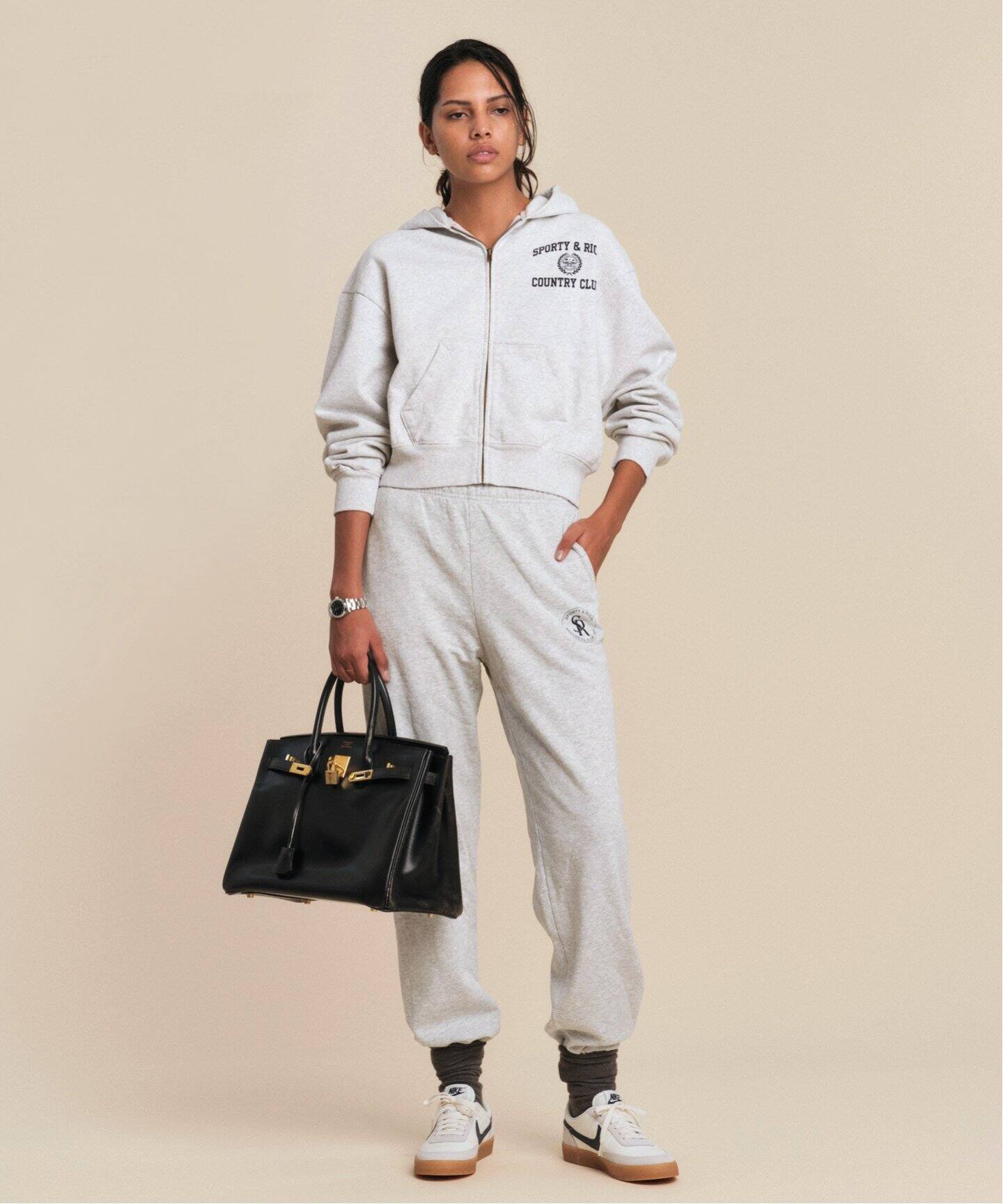 SPORTY&RICH/スポーティアンドリッチ】 Zipped Cropped Hoodie 