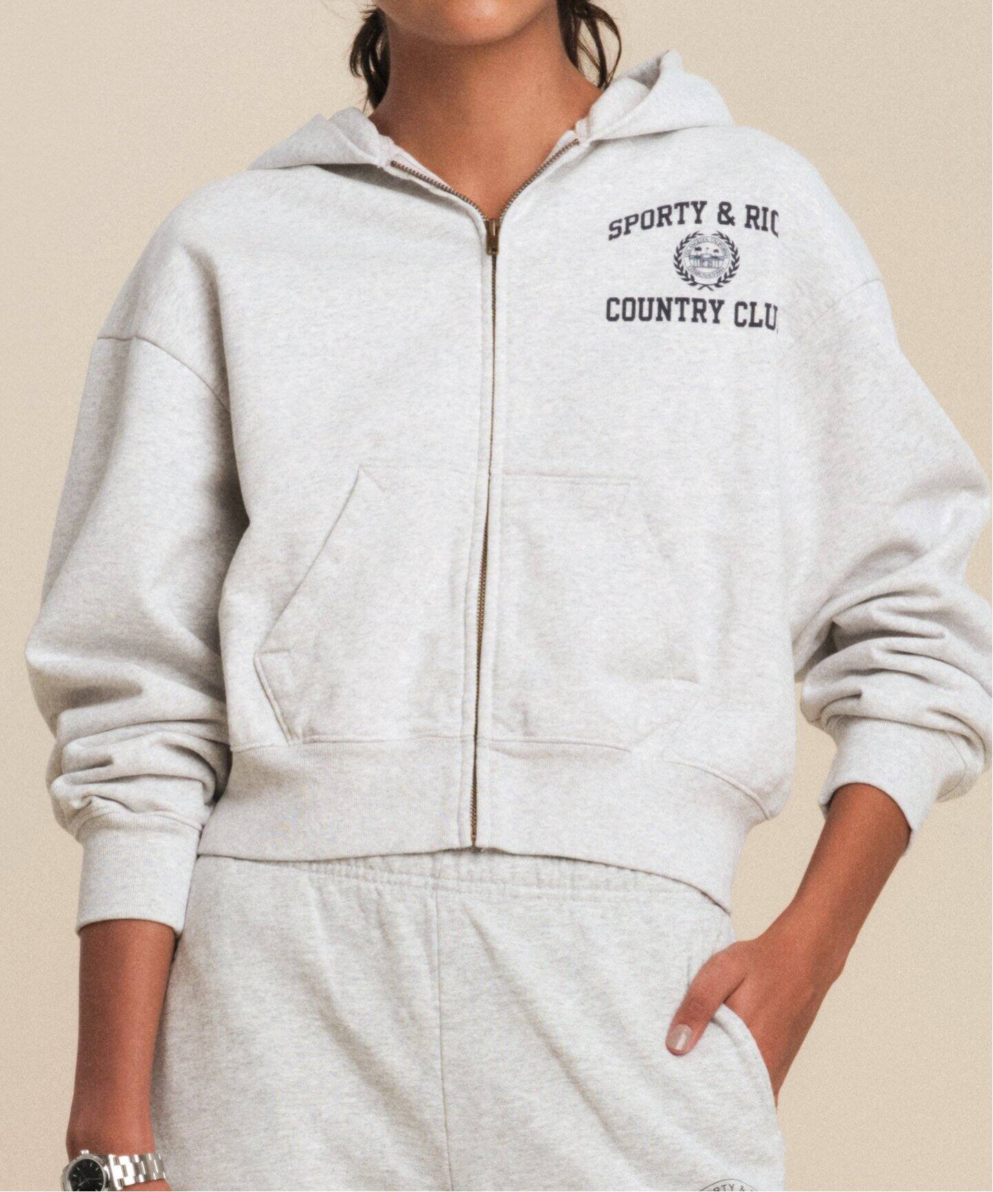 SPORTY&RICH/スポーティアンドリッチ】 Zipped Cropped Hoodie  