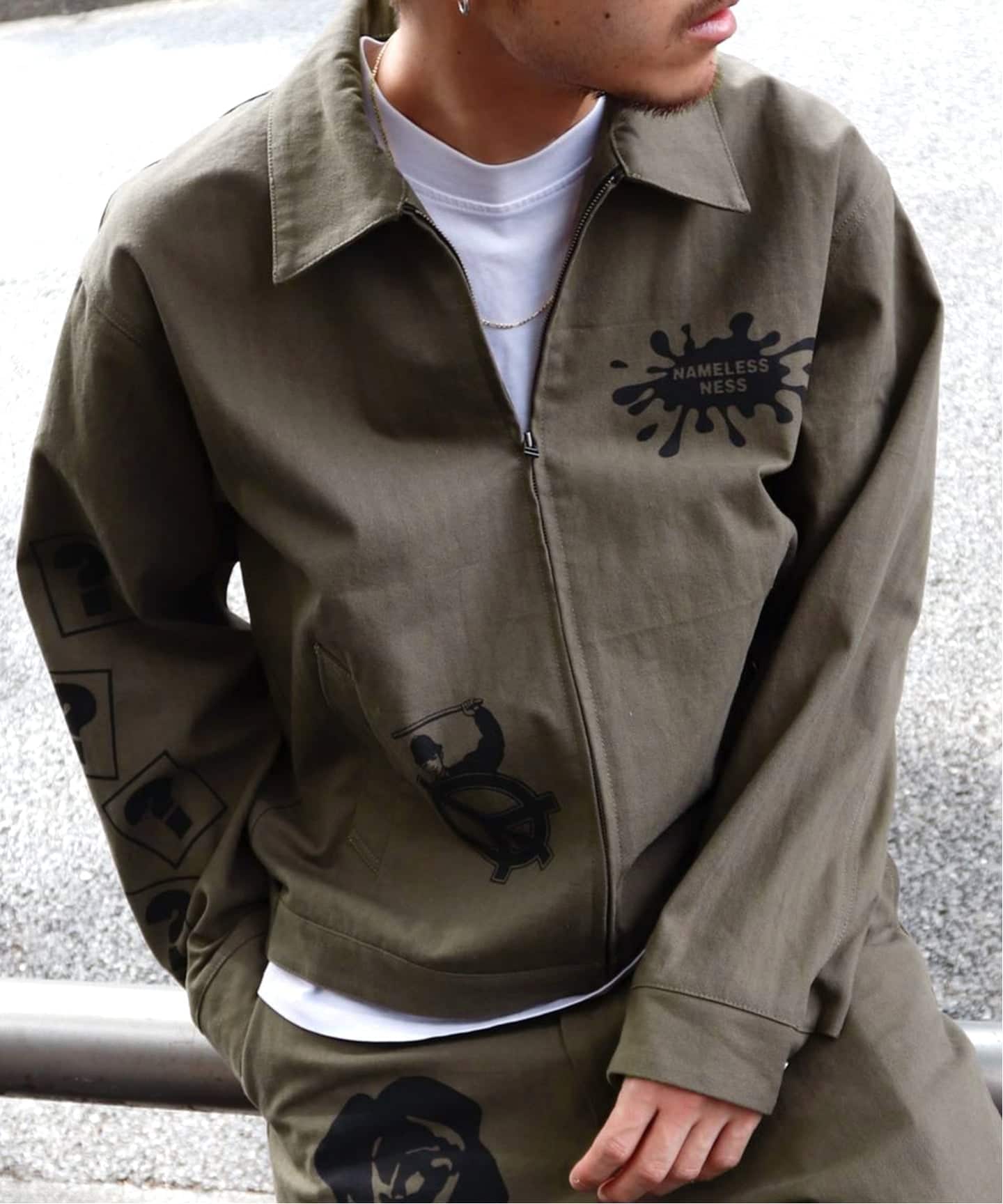 NAMELESSNESS / ネームレスネス HERRINGBONE ZIP BLOUSON PRINT