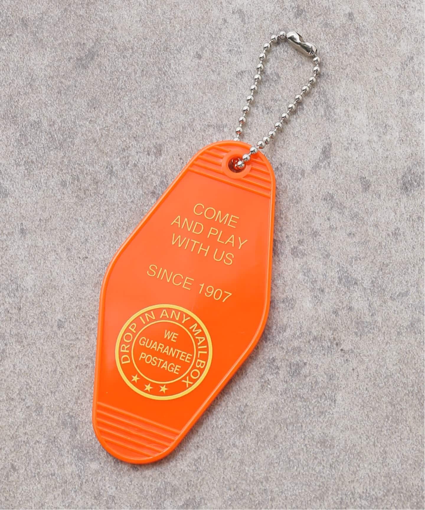 未使用品 試着のみTICCAキーチャーム付きロングN2B TICCA / ティッカ】キーチャームツキ longN2B（その他アウター