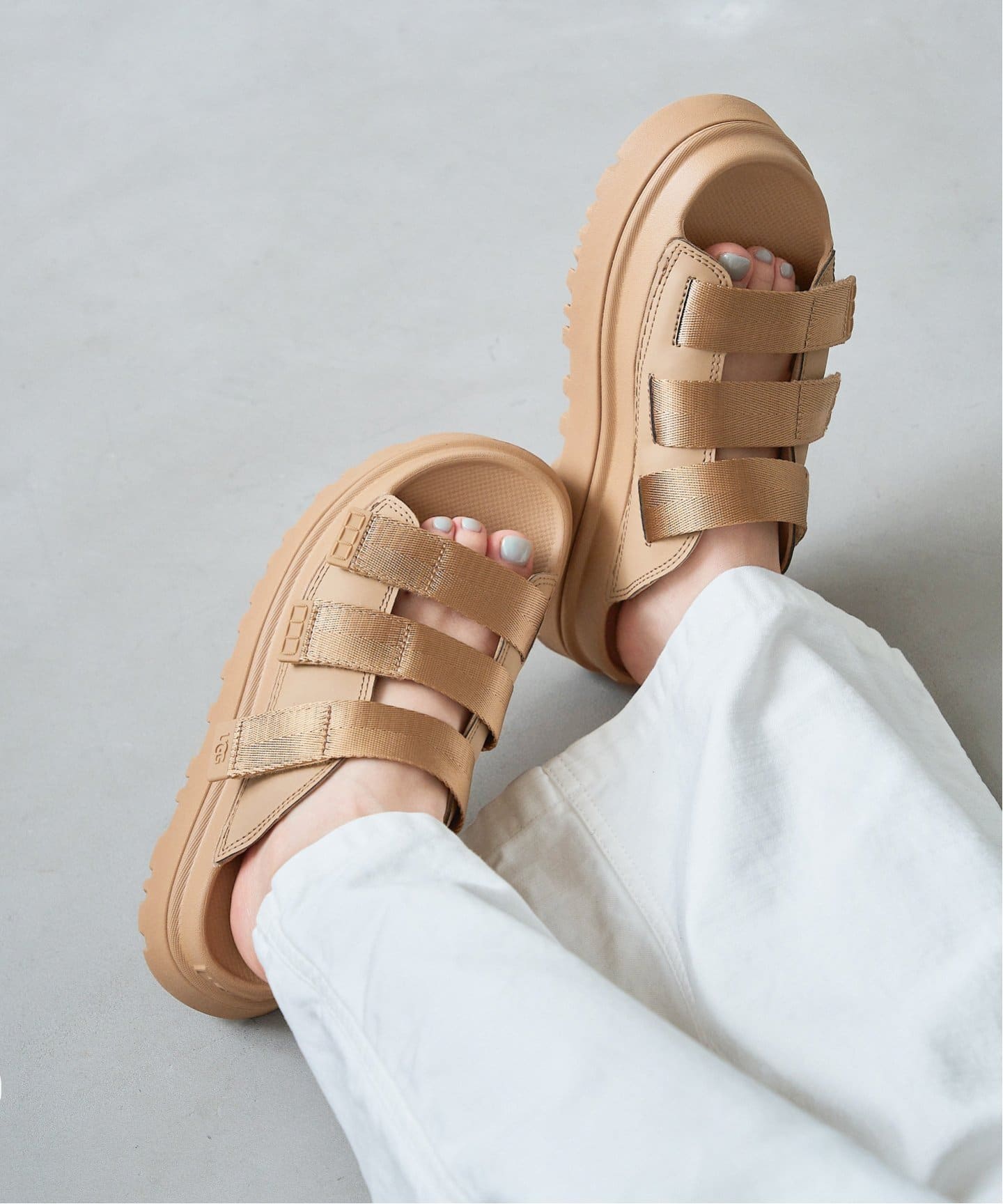UGG/アグ W GOLDENGLOW SLIDE（サンダル）｜LE TALON（ル タロン