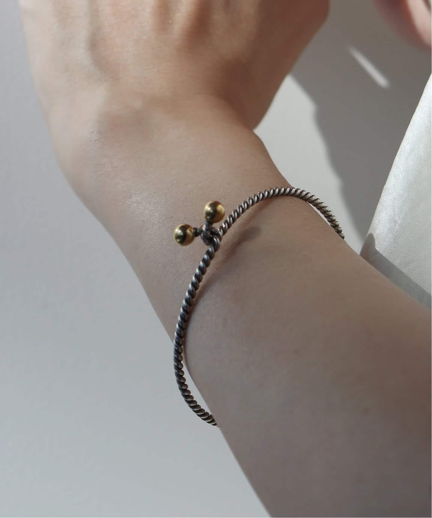 VINTAGE TIFFANY&Co./ティファニー】 Double eye twist bangle