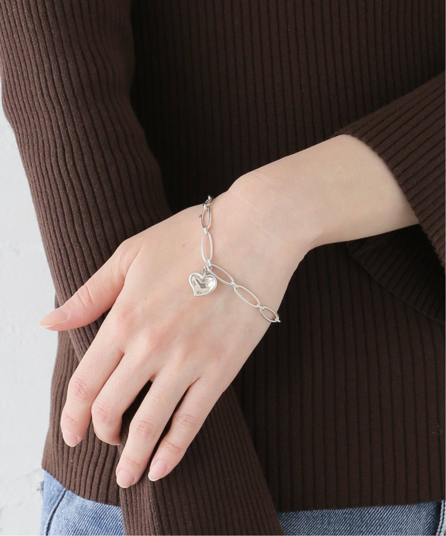 VINTAGE TIFFANY&Co./ティファニー】 Curved heart bracelet oval link