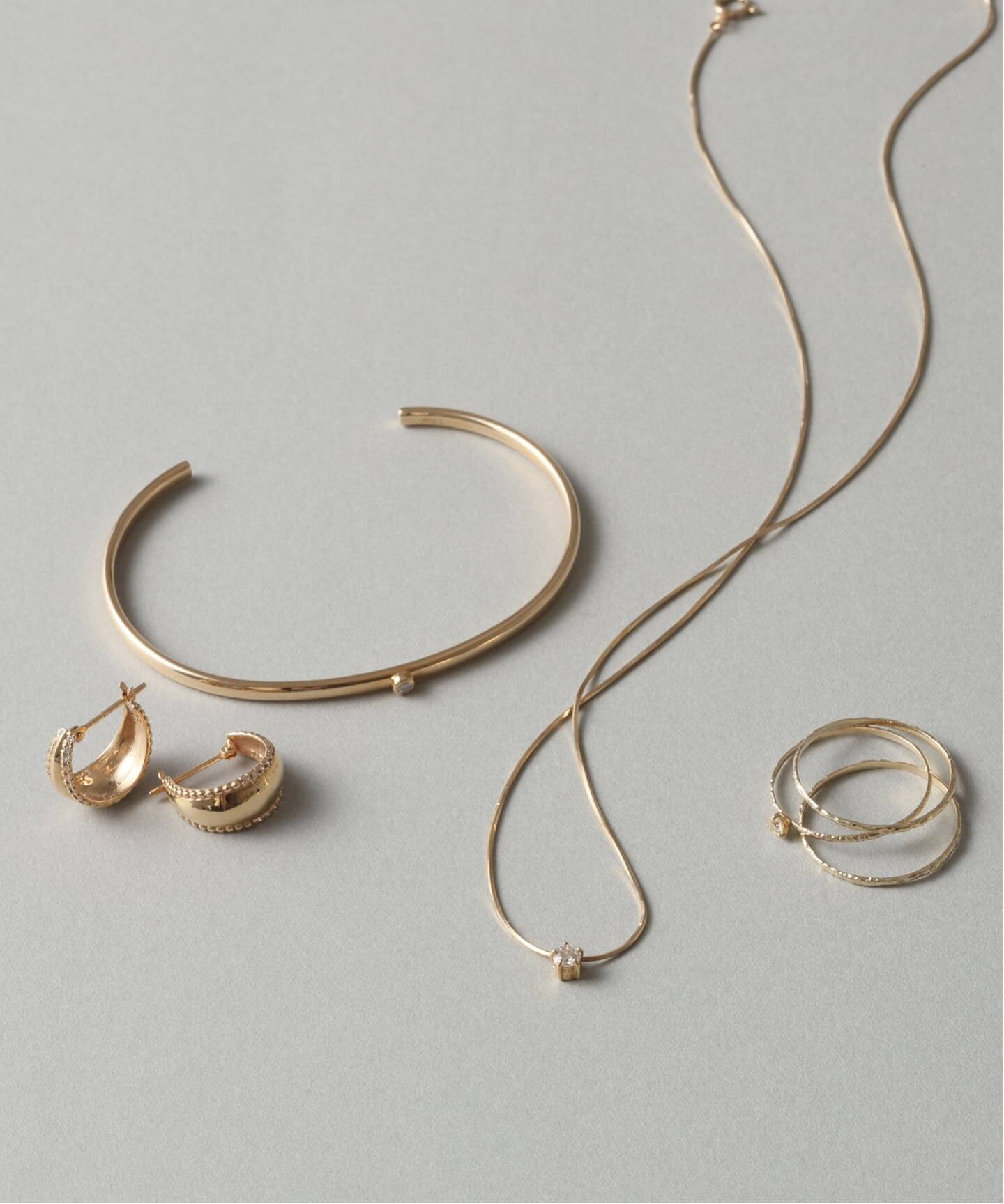 10th三日月サイドダイヤピアス K10（両耳）（ピアス（両耳用