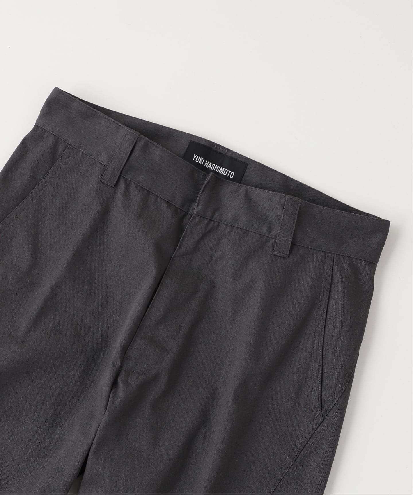 YUKI HASHIMOTO / ユウキハシモト TWISTED FLARED PANTS（スラックス